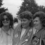 Arlene Mantle is photographed with two other women activists and union members at the 1986 support rally for United Bank Workers Local on strike against CIBC VISA.