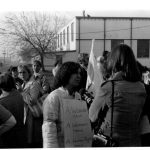 Deirdre Gallagher of Organized Working Women speaks to reporter at Fleck Solidarity Action.