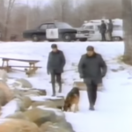 Still from the film "Conspiracy of Silence" featuring a blurry image of two white men walking in the snow with a dog.