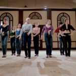 Still from the film "Flamenco at 5:15" featuring a co-ed group of National Ballet School dancers learning how to dance the flamenco.