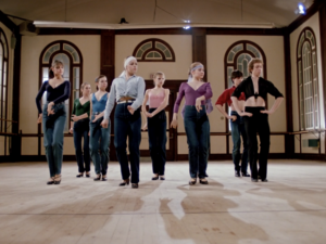 Still from the film "Flamenco at 5:15" featuring a co-ed group of National Ballet School dancers learning how to dance the flamenco.