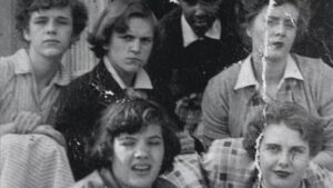 Still from the film "Until Someone Listens" depicting a black and white archival image of white women who were institutionalized in the 20th century.