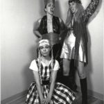 The Clichettes in Out for Blood, performed at the Factory Theatre Studio Cafe Lab. Louise Garfield (standing, left), Janice Hladski (standing, right), Johanna Householder (seated). Photo by David Hlynsky.