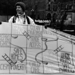 Photo from the Banner Project in 1990 showing B.C. Federation banner depicting the fight to end women's inequality as a Snakes and Ladders game. Women's groups across Canada were asked to produce a protest banner that would become part of a huge banner in Ottawa. The goal was to show the strength and solidarity of women during the Third Commonwealth meeting of Ministers Responsible for Women’s Affairs in October 1990.