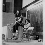 Photo taken at the 1973 Feminist Symposium Féministe in Montreal. Anne Cools, an organizer of the symposium, chaired the opening night session where Selma James spoke about “Revolutionary Feminism and the Kitchen”. (l to r) Selma James, Anne Cools