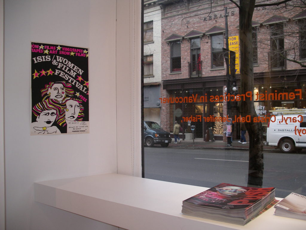 Photo of ISIS Women & Film Festival poster displayed at ARTSPEAK Gallery Exhibit (2009). The theme of the Exhibit was "Persistence: An Archive of Feminist Practices in Vancouver".