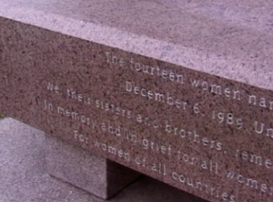 Still from the film "Marker of Change" depicting a stone slab with a description of the Montreal massacre etched into it.