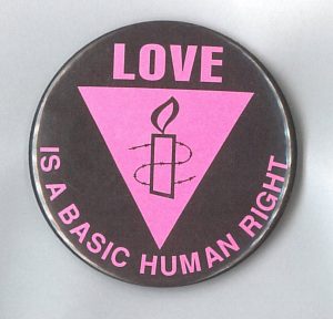 This undated button by Amnesty International button supports human rights for all regardless of gender identity or sexual orientation.