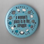 This is an undated button created by Canadian Union of Postal Workers in celebration of March 8th, International Women's Day.