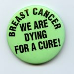 The slogan raises the need for attention to research into breast cancer and treatments.