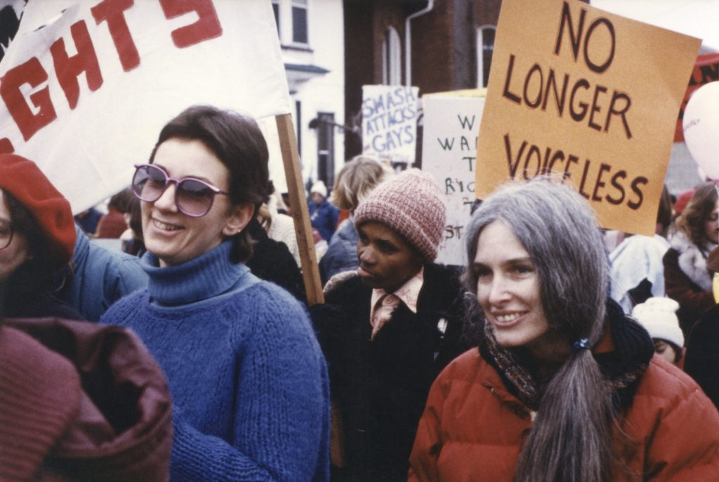 Photo of Carolyn Egan at a Toronto International Women's Day March. Carolyn has been an organizer for the Toronto March 8th events since this date was reclaimed by feminists in the late 1970s.