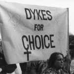 This photo of Dykes for Choice was taken at a rally in support of Dr, Morgentaler and the Toronto abortion clinic in 1983. From left to right: Christine Donald, Heather Ramsay, Gay Bell, and Virginia Adamson.