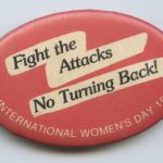 The theme for International Women's Day 1990 in Toronto was "Fight the Attacks - No Turning Back" which highlighted women's resistance to any attacks on the gains that had been achieved for women's equality.