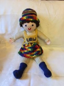 Photo of knitted doll made by striker as a fundraiser for the 1978 strike at Fleck Manufacturing