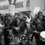 The Shadowland "Shitheads" drummers join the March 1990 celebration of the International Women's Day in Toronto. Vanessa Alexander and Joanna Kidd are in the front row, with Leida Englar behind. Photograph by Amy Gottlieb.