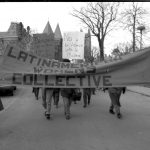 A photograph of the Latin American Women's contingent and banner at the Toronto IWD March in 1990.