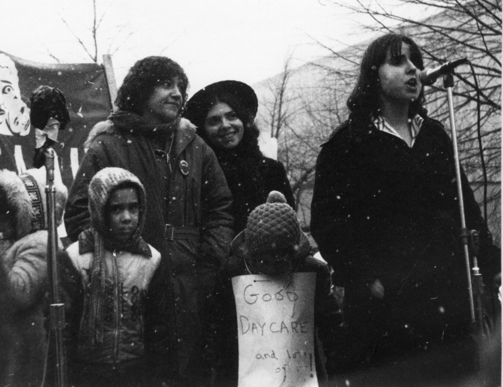 Feminist activists Deirdre Gallagher and Debbie Field are photographed at IWD March in Toronto. Photograph by Amy Gottlieb.