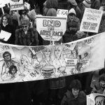 The banner of the Congress of Canadian Women calls for Peace not War at the1983 International Women's Day March in Toronto.