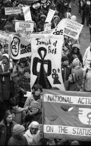 Feminists of Faith join the Federation of Women Teachers' Association of Ontario, the Congress of Canadian Women, and the National Action Committee on the Status of Women at the 1983 International Women's Day March in Toronto.