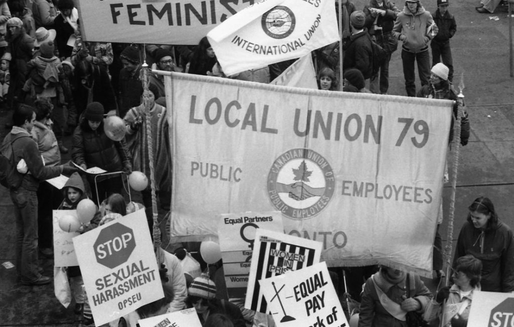 Banners of the Canadian Union of Public Employees (CUPE) Local 79 are seen at the 1983 International Women's Day March in Toronto.