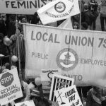 Banners of the Canadian Union of Public Employees (CUPE) Local 79 are seen at the 1983 International Women's Day March in Toronto.