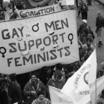 This photo captures the Gay Men in Support of Feminists at the 1983 International Women's Day March in Toronto.