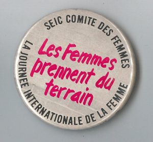 This undated button was created by the SEIC Comité des Femmes for International Women's Day.