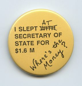 The button was created in 1990 to protest cuts to funding of national women's organizations and local women's centres through the Secretary of State Women's Program.