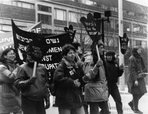 The Jewish Women’s Committee to End the Occupation of the West Bank and Gaza (JWCEO) marched in 1990 anti-war demonstration in Toronto.