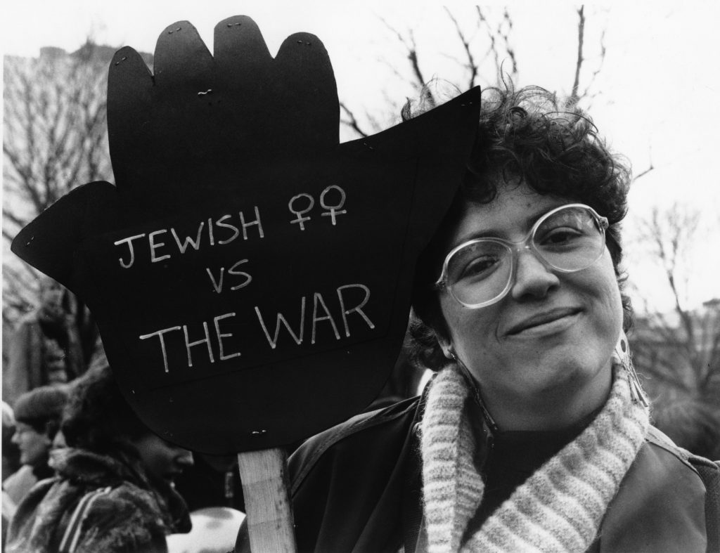 A member of the Jewish Women’s Committee to End the Occupation of the West Bank and Gaza (JWCEO) at 1990 protest against the War in the Gulf.