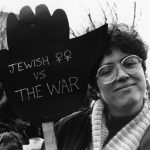 A member of the Jewish Women’s Committee to End the Occupation of the West Bank and Gaza (JWCEO) at 1990 protest against the War in the Gulf.