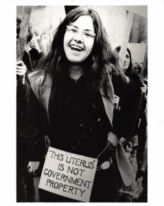 This photo of Jackie Larkin with the sign "This Uterus is not Government Property" was taken during the Abortion Caravan which travelled across Canada from Vancouver to Ottawa in 1970.