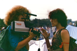 This photo is one of a number taken at the Oka Peace Camp set This photo is one of a number taken at the Oka Peace Camp set up in July 1990 in solidarity with the Mohawks of Kanehsatake who rose up in defense of their ancestral lands after the Oka Golf Club proposed an extension and the building of luxury condos over a Mohawk ancestral graveyard in the sacred wooded area known as “The Pines”. This land had never been ceded. In early July, after the Mohawks refused to end their non-violent occupation of the area or to take down the barricade, the Sûreté du Québec (Quebec police) moved in resulting in a violent confrontation. Later, the Canadian army was called in. Mohawk women, including Ellen Gabriel, played a central role in the uprising, which lasted for 78 intense days (July 11 – September 26, 1990). In the end, the golf course was not extended, and the condos were not built. But the larger issues of land sovereignty have never been resolved. in July 1990 in solidarity with the Mohawks of Kanehsatake who rose up in defense of their ancestral lands after the Oka golf course proposed an extension and the building of luxury condos over a Mohawk ancestral graveyard in the sacred wooded area known as “The Pines”. This land had never been ceded. In early July, after the Mohawks refused to end their non-violent occupation of the area and to take down the barricade, the Sûreté du Québec (Quebec police) moved in resulting in a violent confrontation. Later, the Canadian army was called in. Mohawk women, including Ellen Gabriel, played a central role in the uprising, which lasted for 78 intense days (July 11 – September 26, 1990). In the end the golf course was not extended and the condos were not built. But the larger issues of land sovereignty have never been resolved.