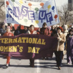 The theme of the 1984 International Women's Day in Toronto was Rise Up.