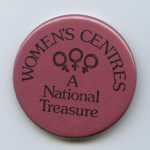 A button defending women's centres after major funding cuts in 1990.