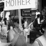 Supporter at 1983 rally in support of abortion rights outside the Morgentaler Clinic in Toronto. The Women's Bookstore can be seen in the background.