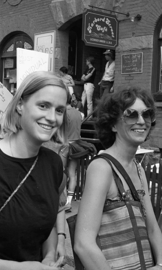 Anne McClard and Lois Pike join other protesters at a 1983 rally organized in support of Dr. Morgentaler and legalizing free-standing abortion clinics. The rally was held outside Dr. Morgentaler's clinic on Harbord Street in Toronto.