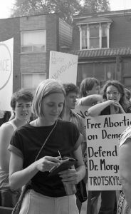 Anne McClard is featured in this photo taken at a 1983 abortion rights rally outside Dr. Henry Morgentaler's clinic in Toronto. The rally was organized in support of Dr. Morgentaler and legalizing free-standing abortion clinics.