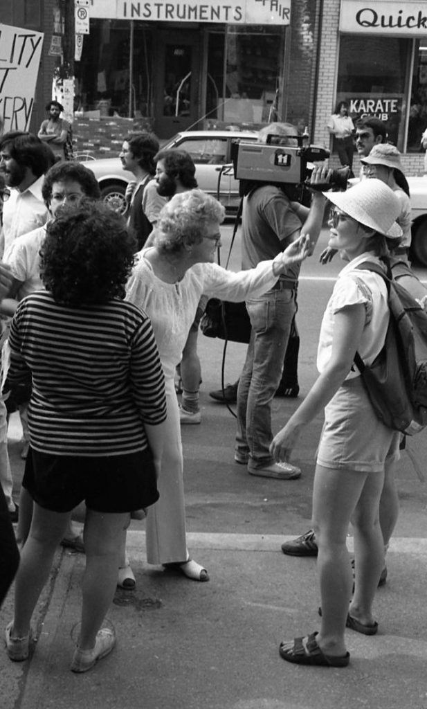 Anti-choice protester confronts participants at support rally outside the Morgentaler Clinic in Toronto. Marianna Valverde is on the left.