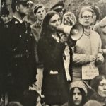 Marcy Cohen uses a megaphone to negotiate with the RCMP as protestors occupied the lawn outside Prime Minister Trudeau's residence. Judy Darcy is in front of her. The demonstrators marched to 24 Sussex after the earlier May 9th march for abortion rights and in response to the Prime Minister, Minister of Justice, and Minister of Health's refusal to meet with organizers.