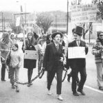 The May 8th Vancouver Demonstration took place in solidarity with the Abortion Caravan and the protests in Ottawa. Anne Roberts and Jean Rands, dressed in men's suits, represent John Munro, Federal Minister of Health, and Ralph Loffmark, B.C. Minister of Health.