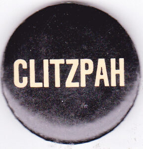 Button with the word "Clitzpah" on a black background.