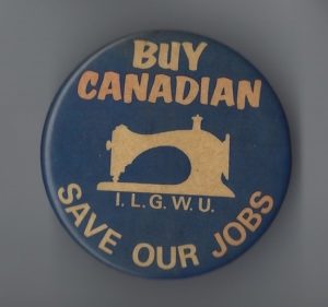 This International Ladies Garment Workers Union (ILGWU) button calls on people to buy Canadian-made clothing and save jobs.