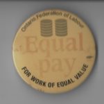 This Ontario Federation of Labour button supports of equal pay for work of equal value.