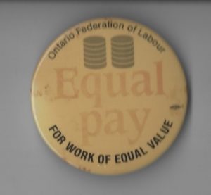 This Ontario Federation of Labour button supports of equal pay for work of equal value.