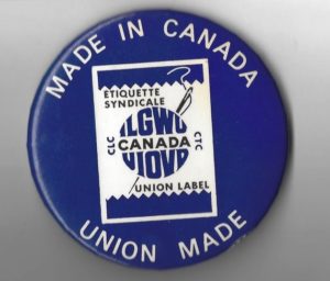 This International Ladies Garment Workers' Union button supports union=made and made-in-Canada clothing.