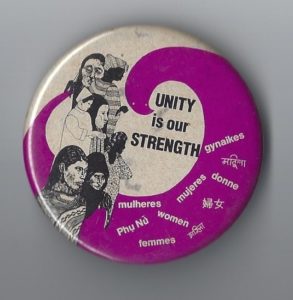 Unity is Our Strength button combines words and images for "woman" from around the world.