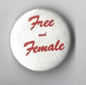 The slogan "Free and Female" is the text of this button.