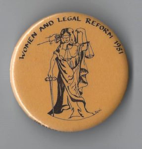 This 1981 button advocates for women and legal reform.