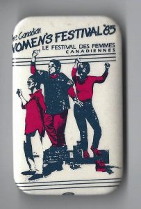 This is a button celebrating the 1985 Canadian Women's Festival / Le Festival des Femmes Canadiennes